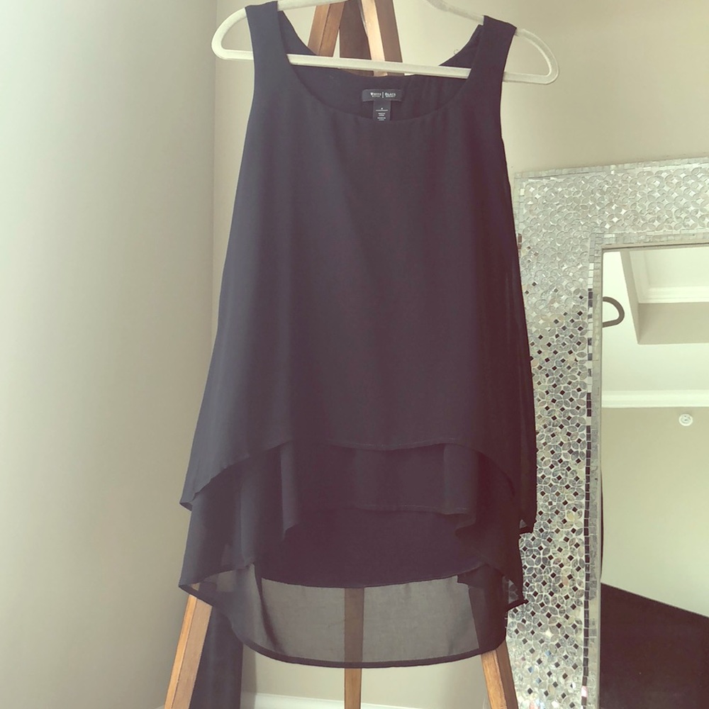 A-frame, multi-layer sleeveless blouse.